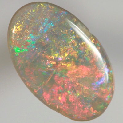 SOLID SEMI BLACK OPAL Bright, sparkly red and orange over green and blue